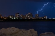 Tonight I went down to the lakefront and watched a storm roll across the northern half of the city. This is one of two frames that had a bolt of [&hellip;]