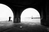 This is a fisherman rigging his pole. The lighthouse stands on four pillars, this is the open space underneath it. This is a seagull I passed on the way back [&hellip;]