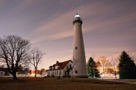 The Wind Point Lighthouse has appeared on the blog before. This is a two minute exposure, taken this evening. The nearby tree… a four minute exposure.