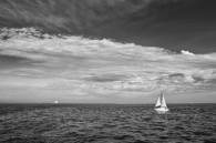 Some nice clouds and a sailboat.
